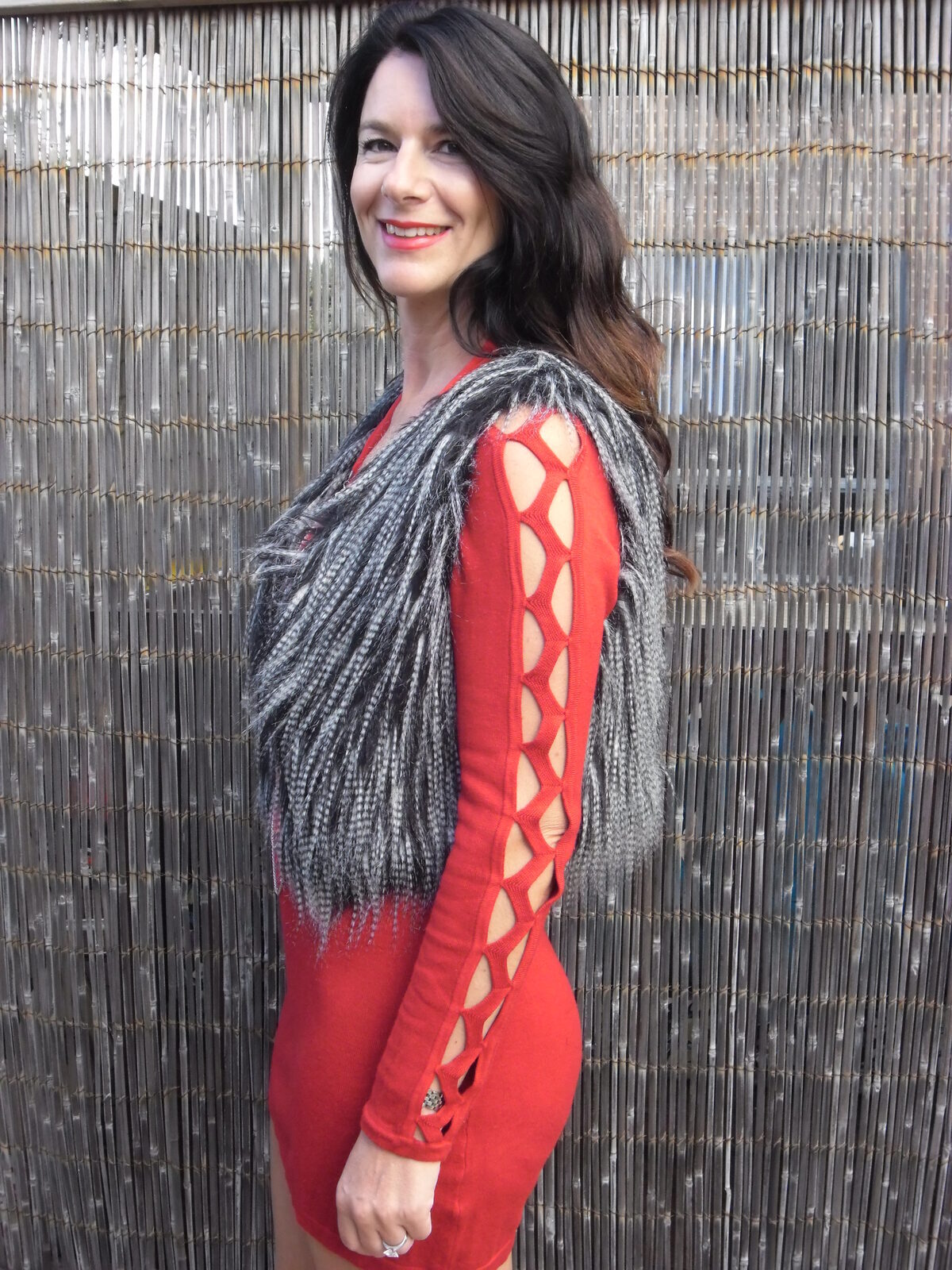 Red dress, fur vest