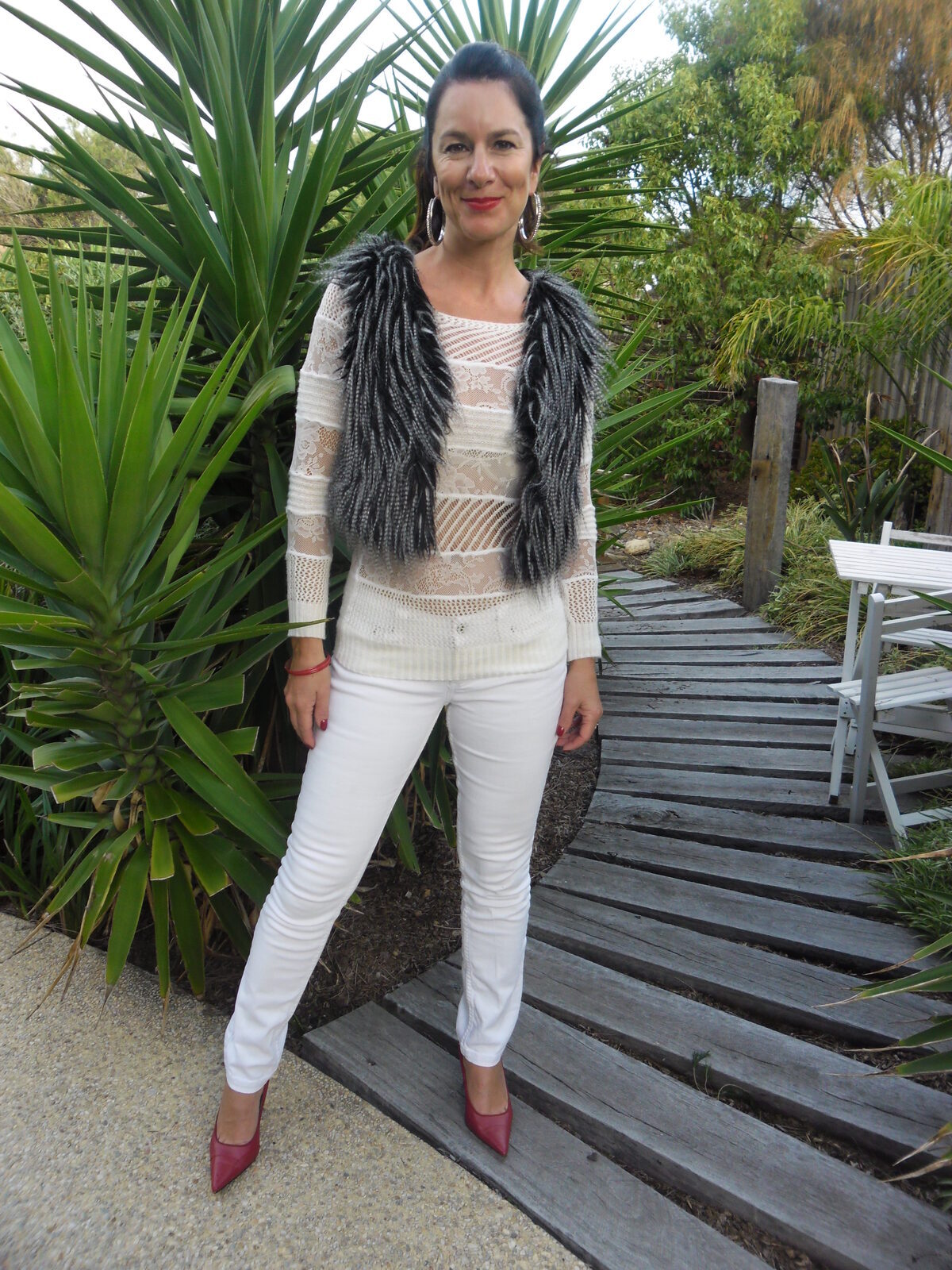 Fur vest, white jeans