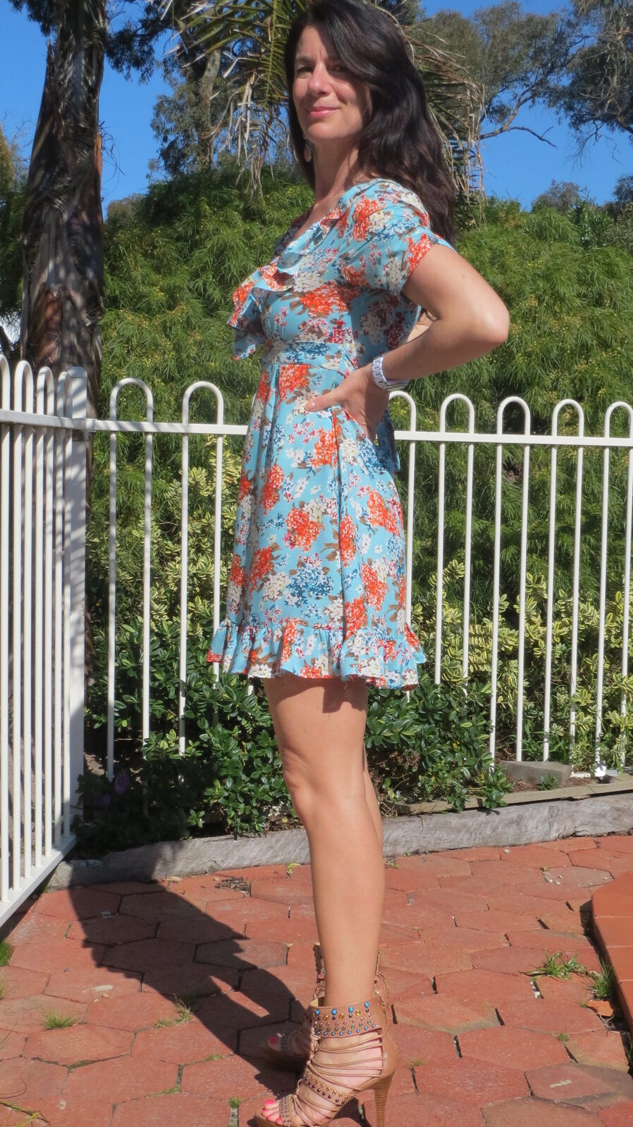 Blue floral ruffle dress side