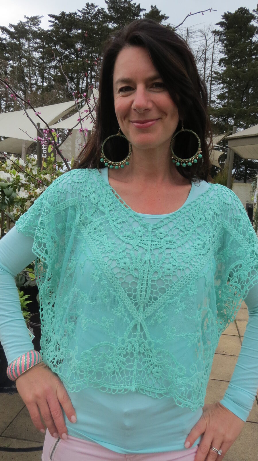 Green lace top, close