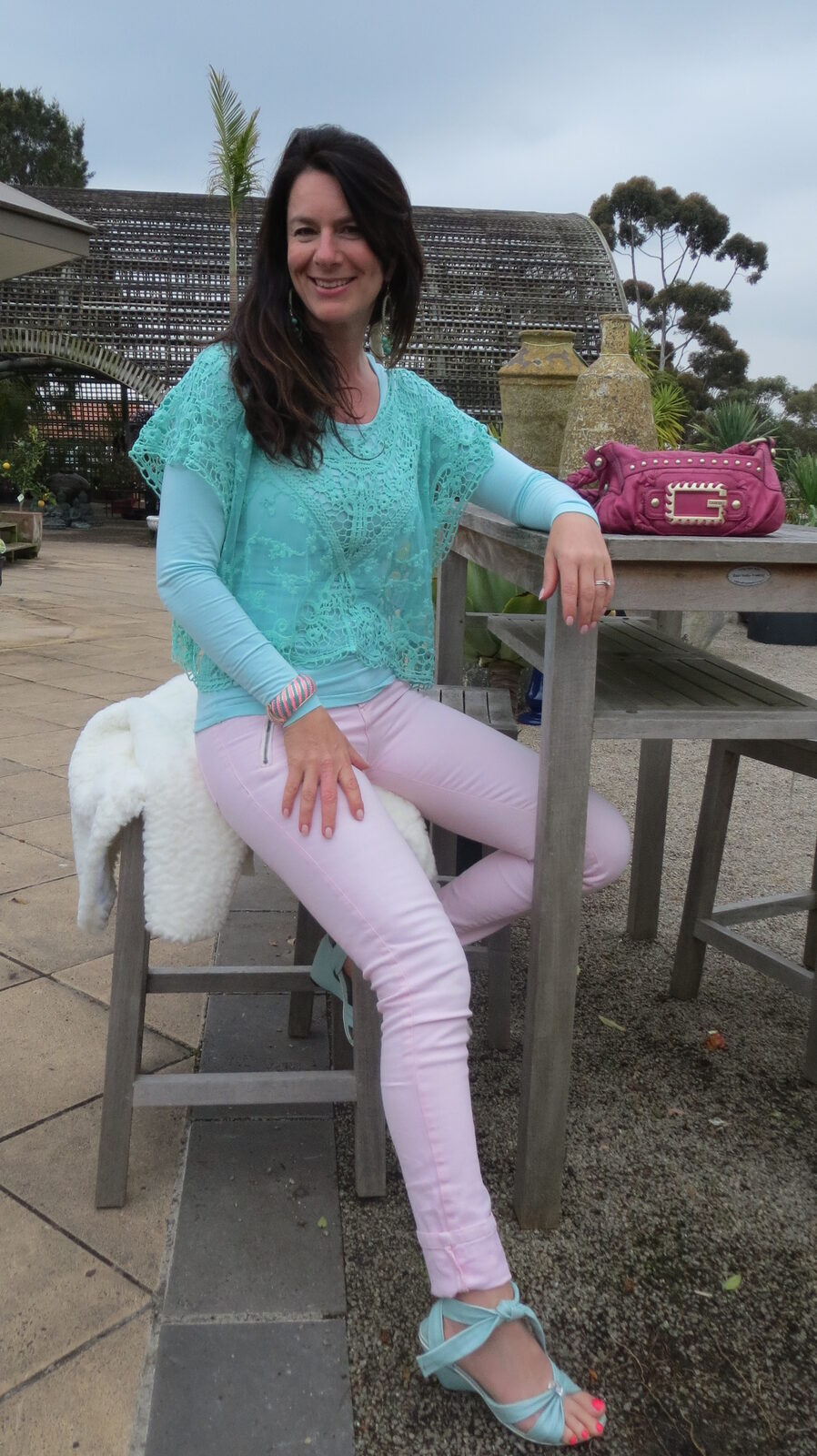Green lace top, pink jeans