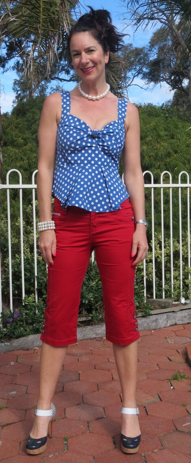 Peplum top, red jeans