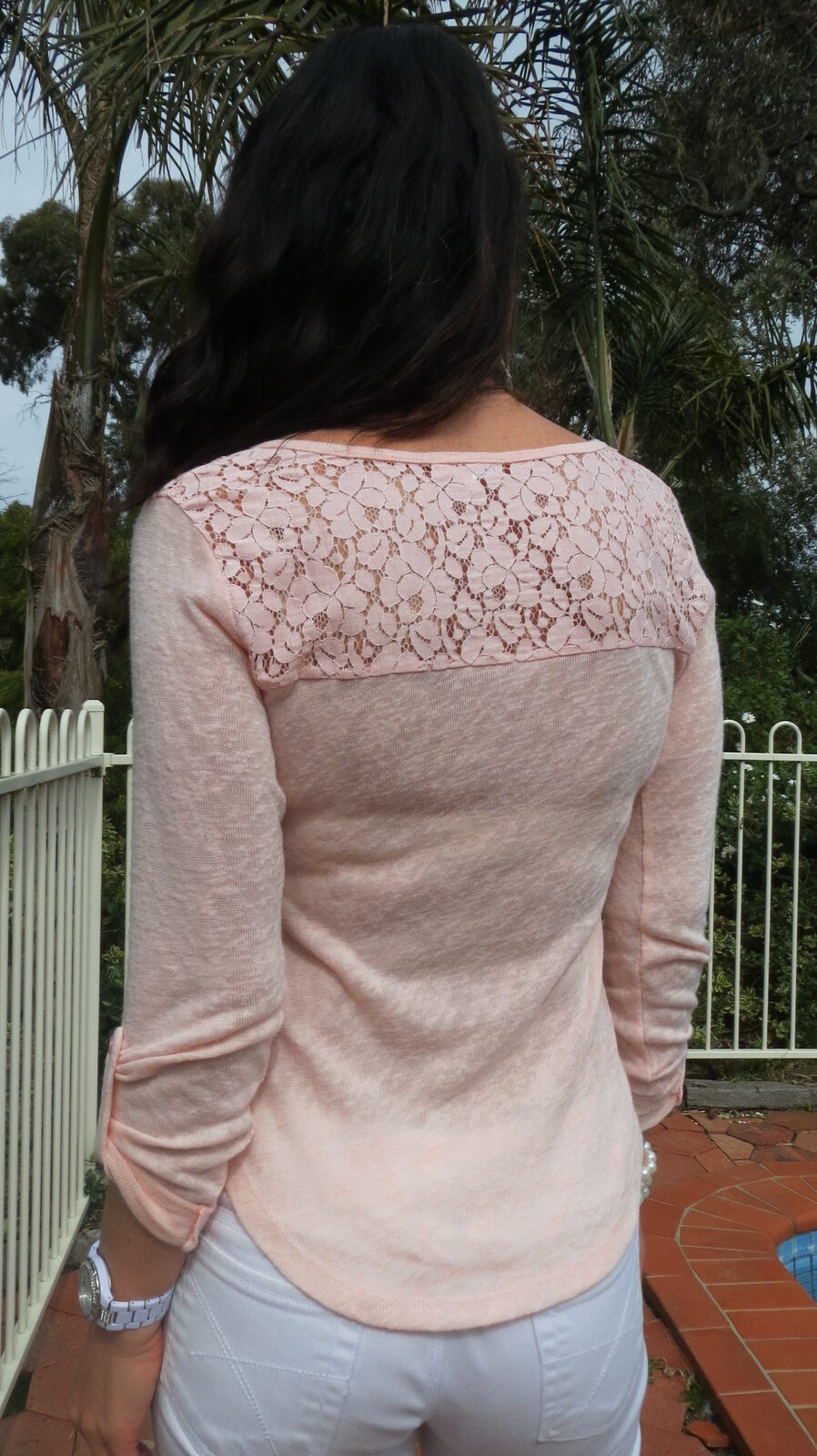 White jeans, pink top back