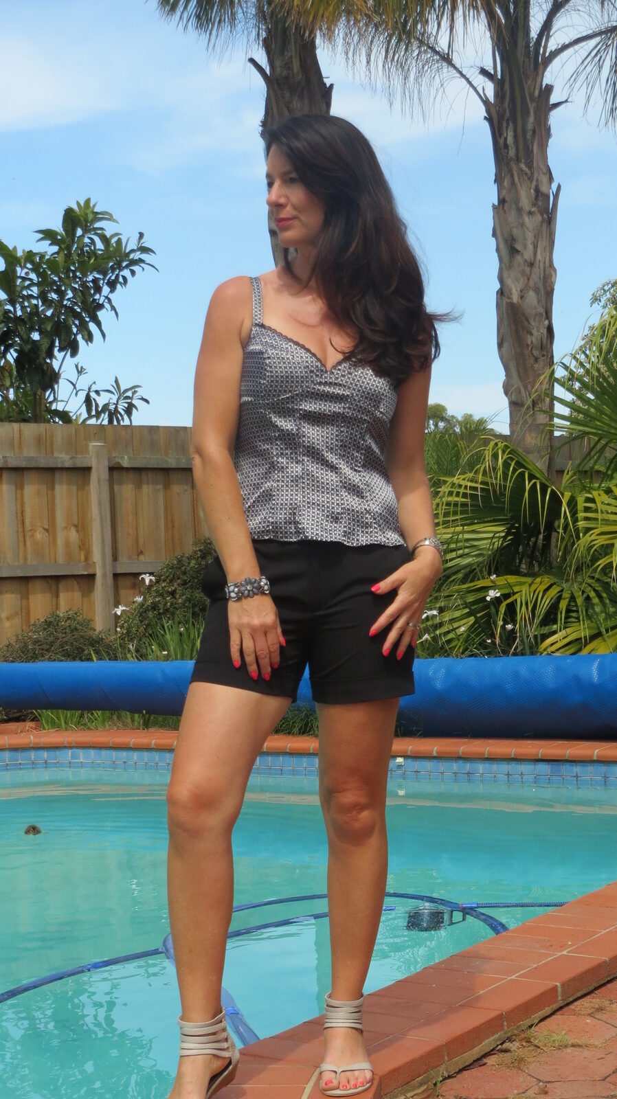 Black Zara shorts, sandals