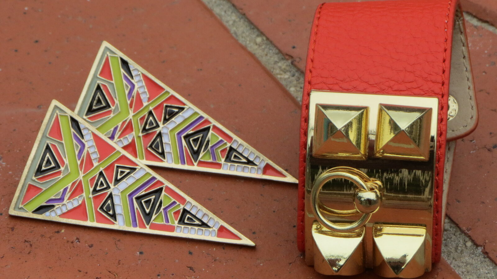 Orange cuff, triangle earrings