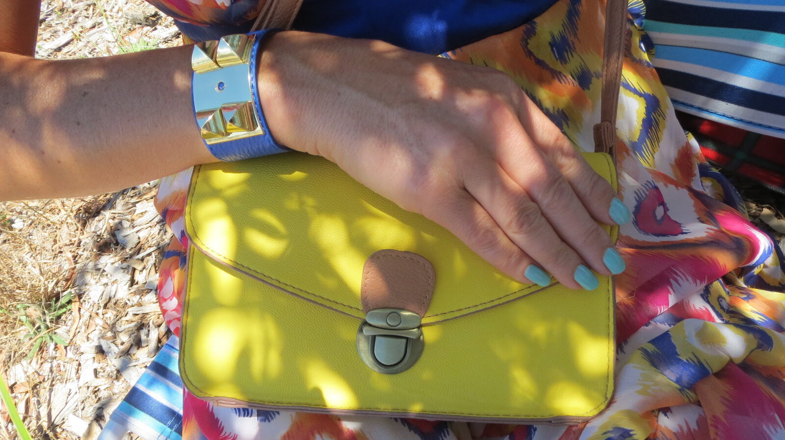 Yellow handbag, blue Diva cuff