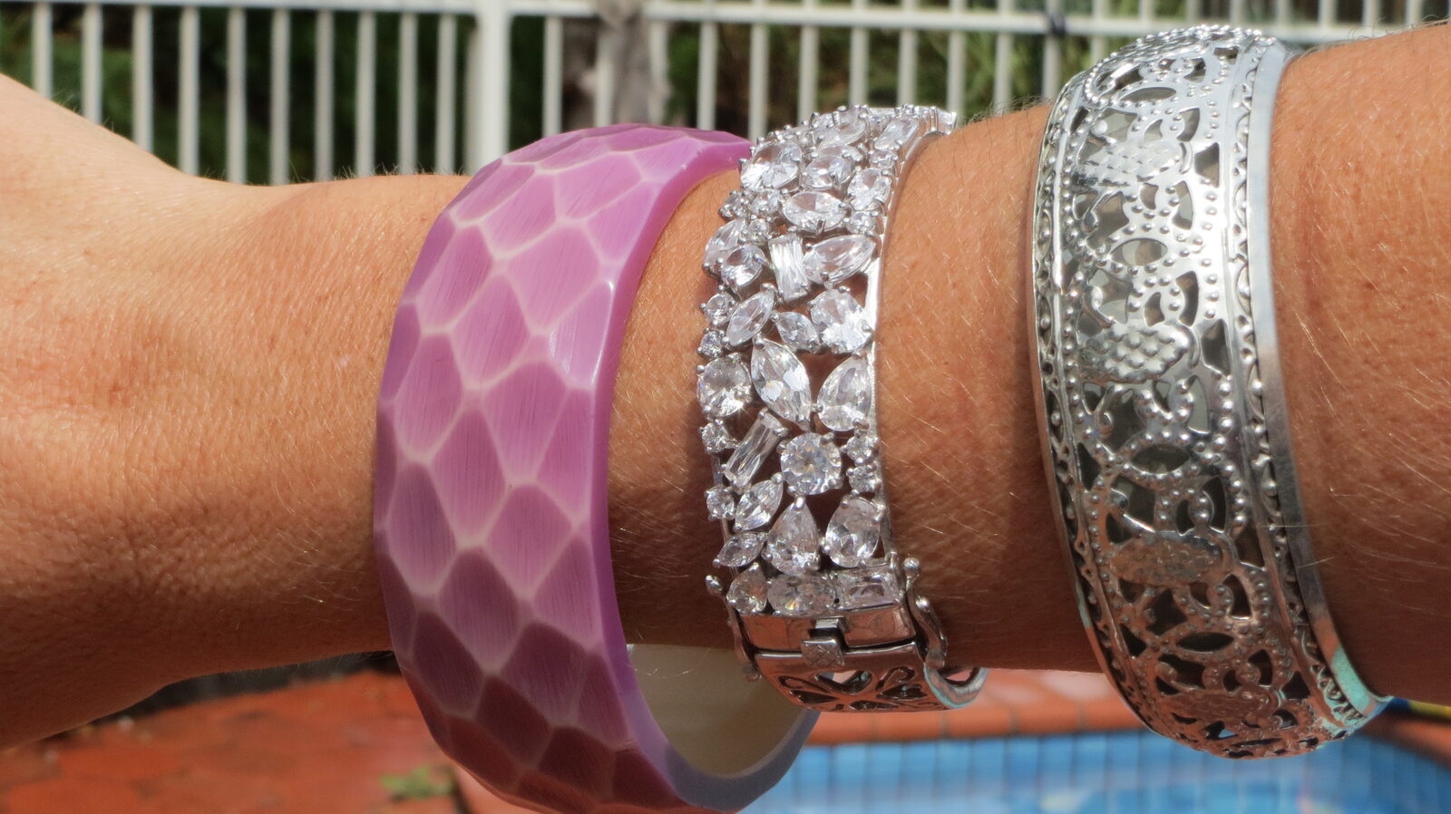 Mauve, diamante and silver bangles