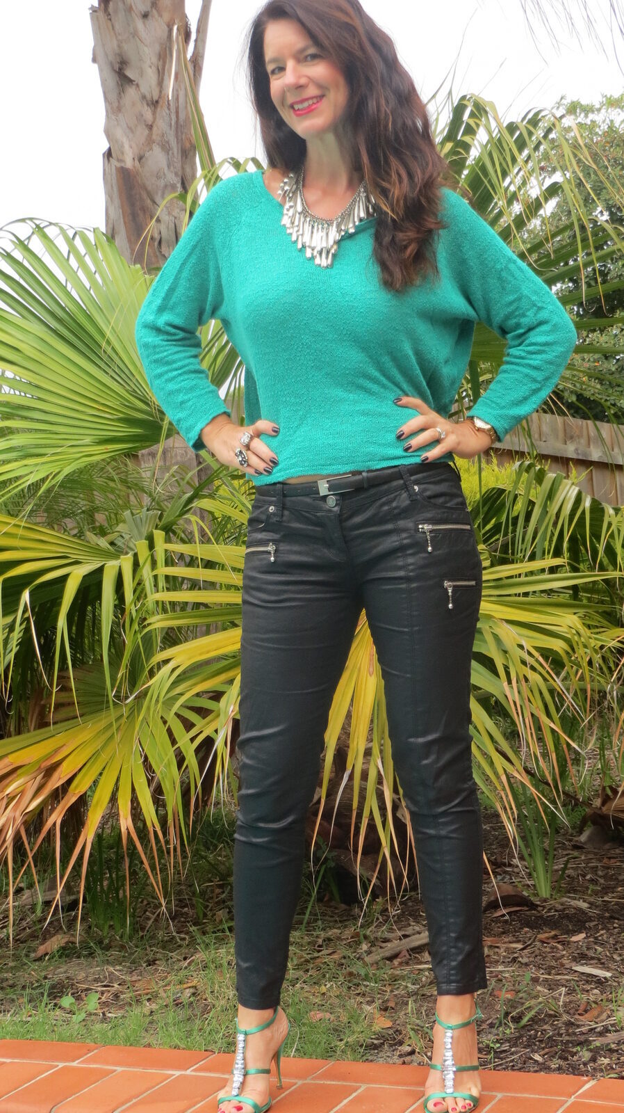 Emerald green jumper, leather jeans 1