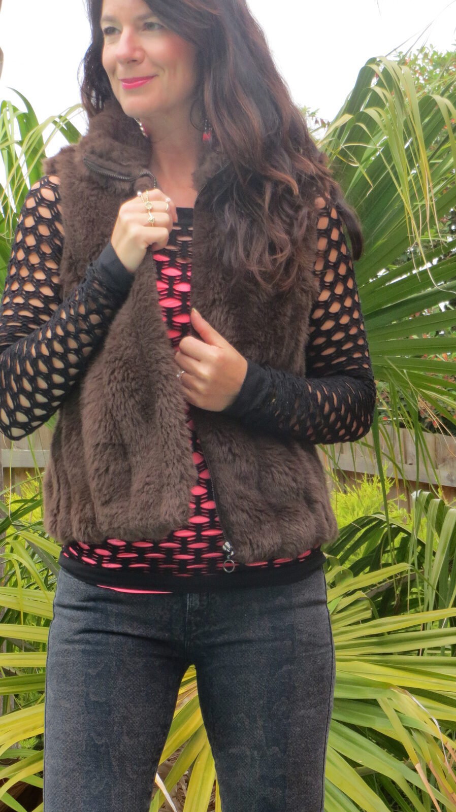 Brown fur vest, snakeskin jeans 3
