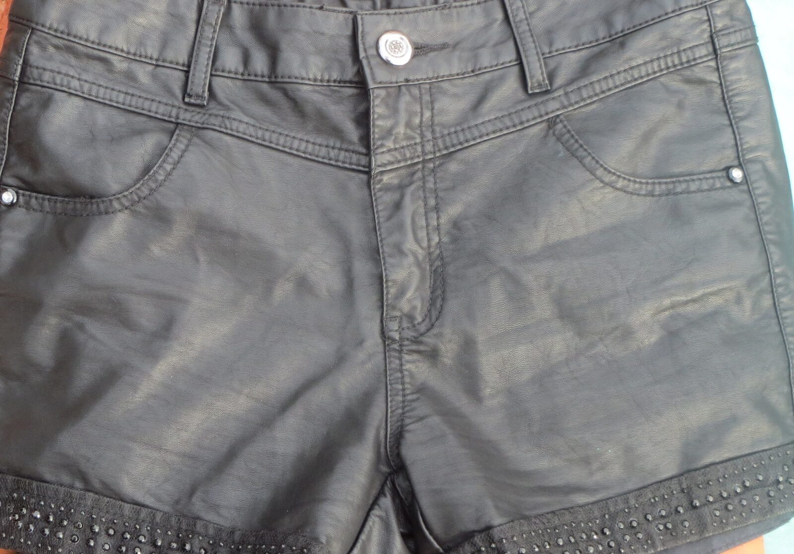 Black leather shorts