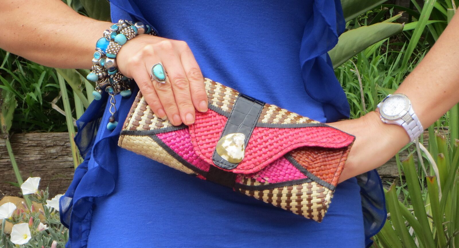 Raffia clutch, blue dress