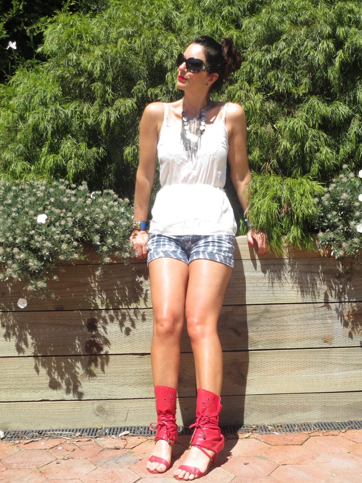 Salvos neckpiece, tie-dye shorts 1