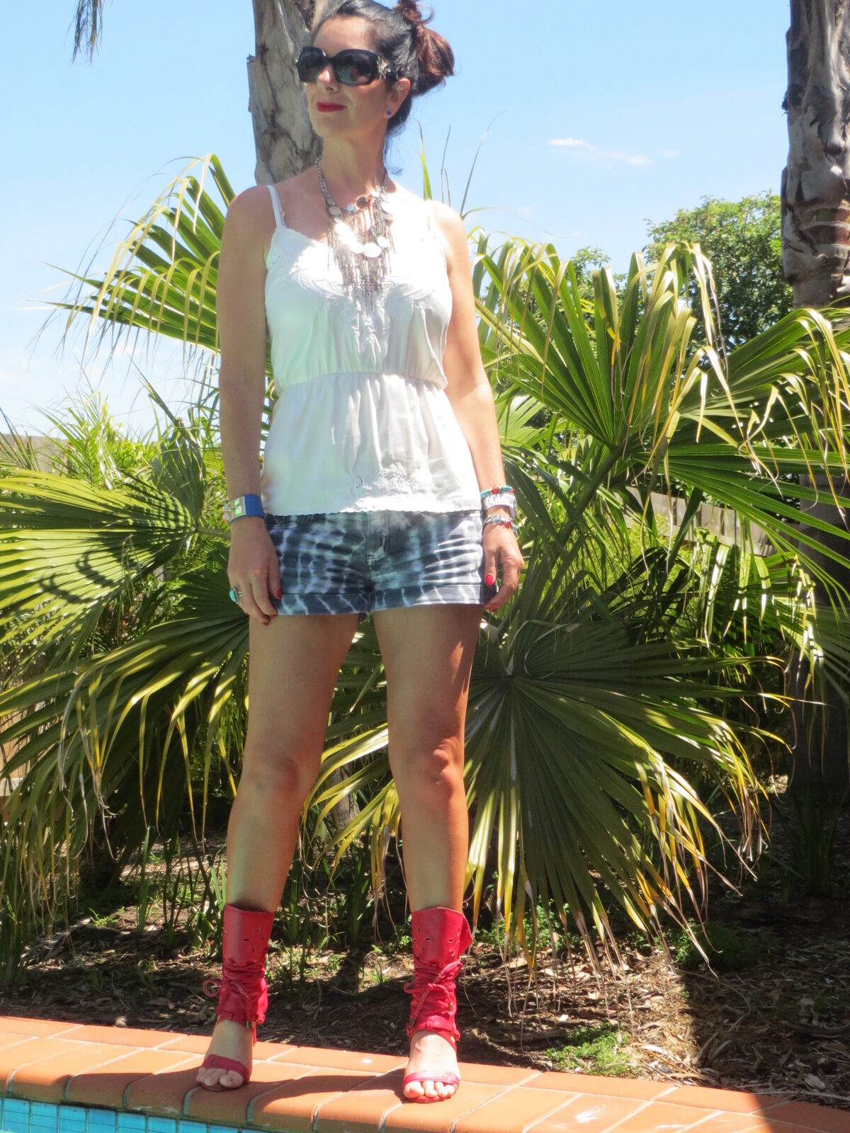 Salvos neckpiece, tie-dye shorts 2