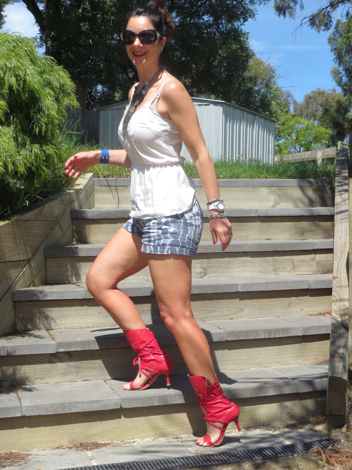 Salvos neckpiece, tie-dye shorts 3