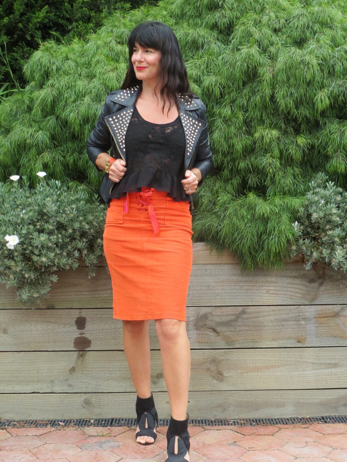 Orange skirt, black leather 1
