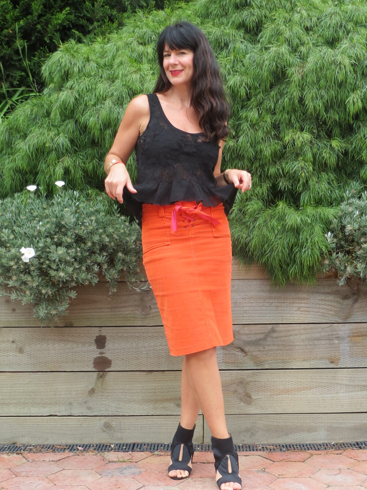 Orange skirt, black leather 7
