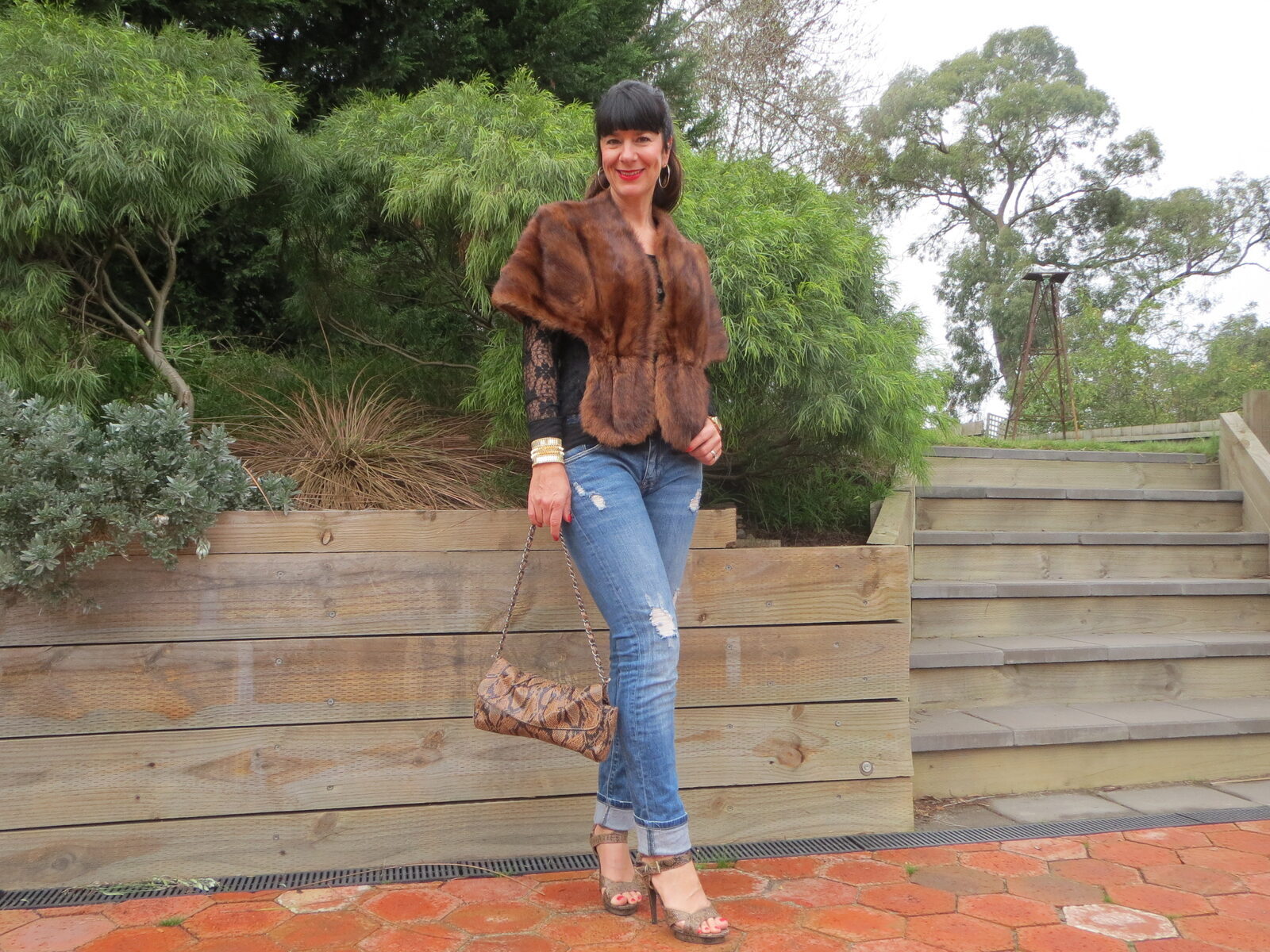 Mink fur stole, snakeskin bag