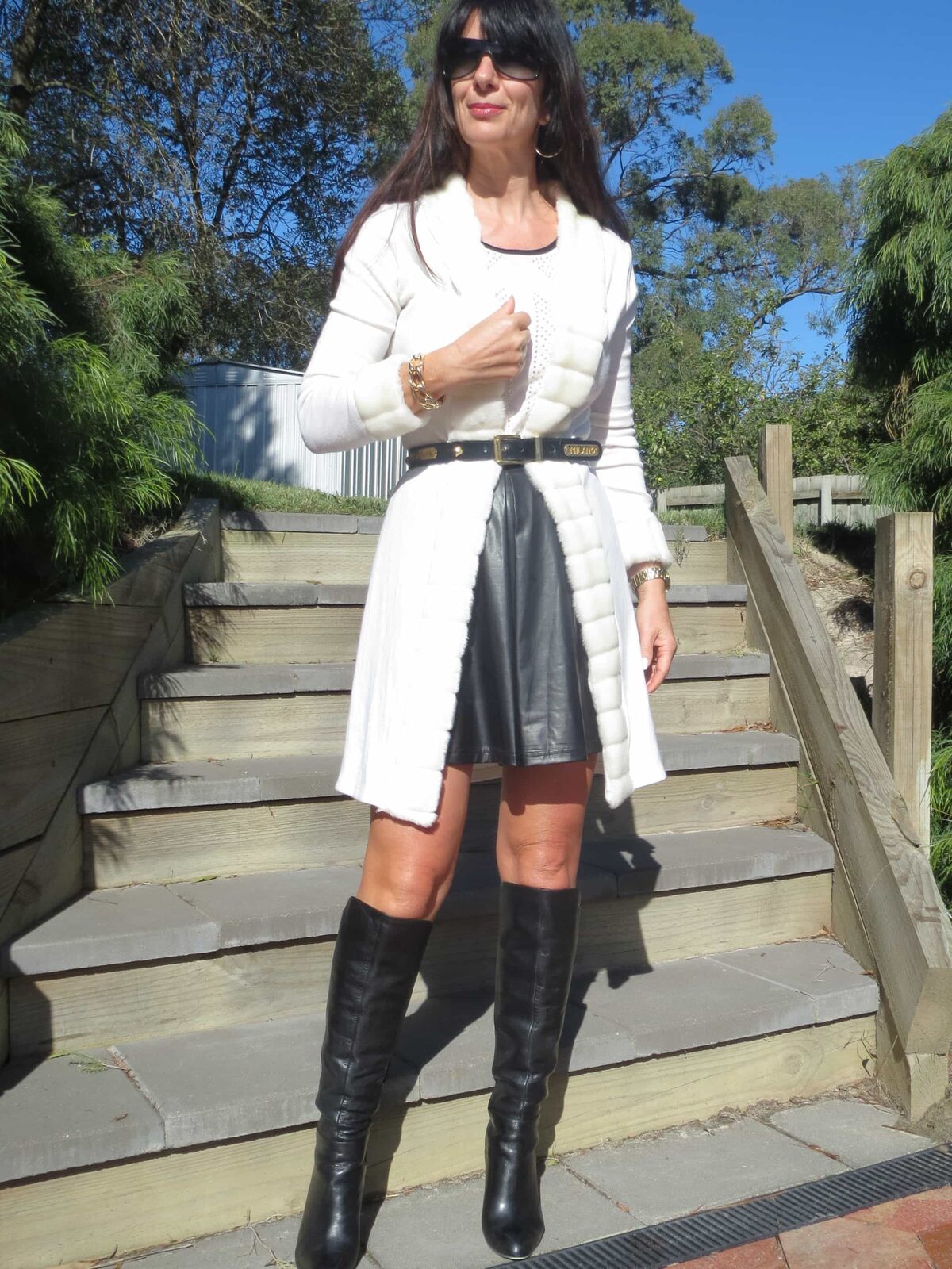 Black skater skirt, knee boots 1