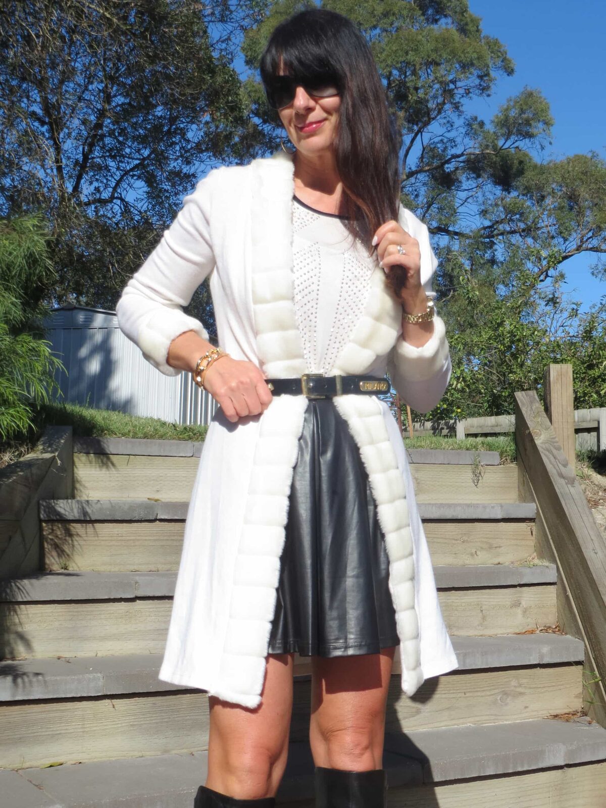 Black skater skirt, knee boots 3