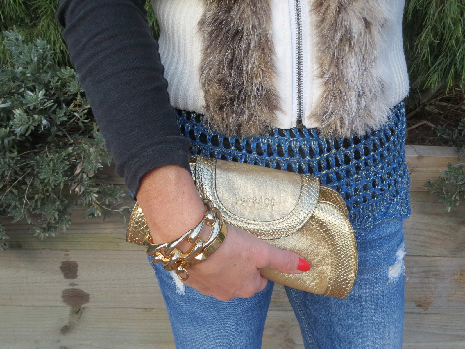 Versace gold clutch, Amber Sceats bangle