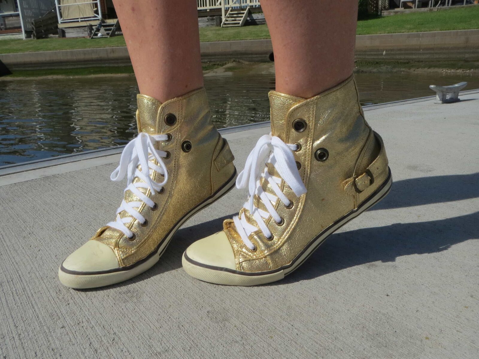 Gold converse sneakers