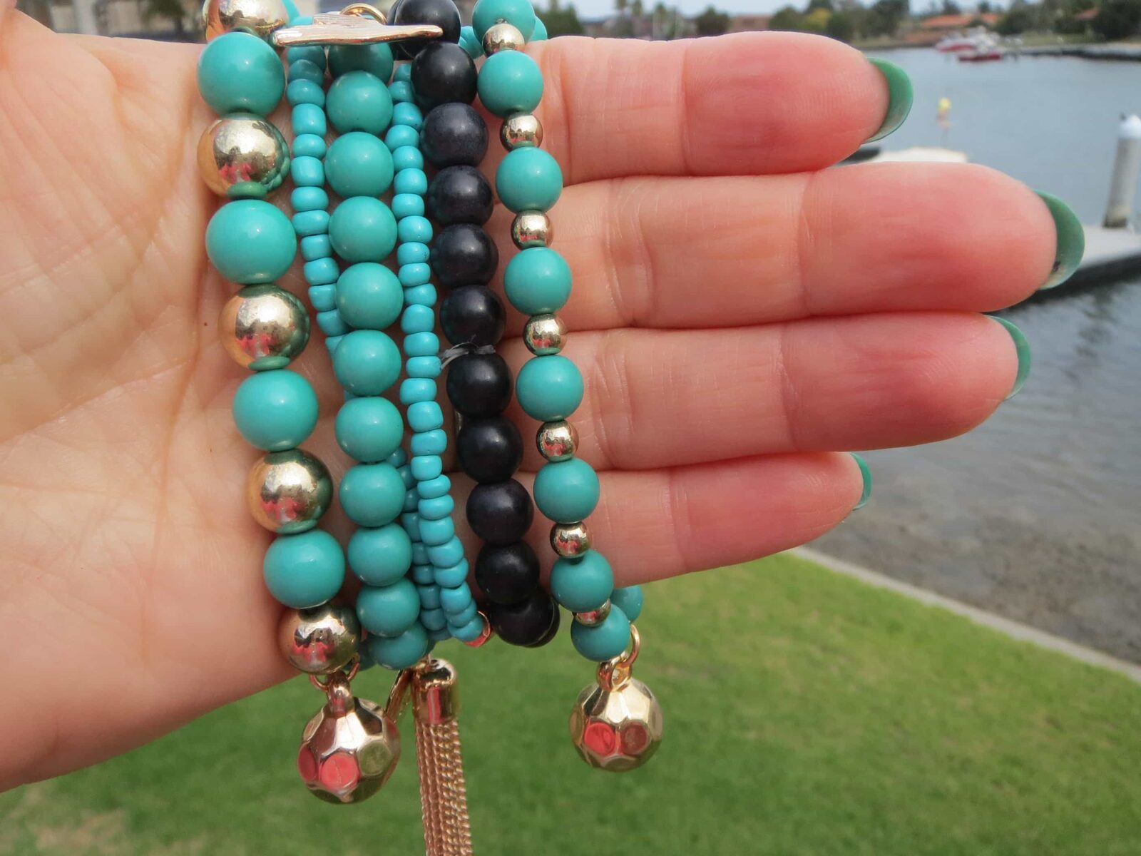 Emerald green nails & bracelets 2